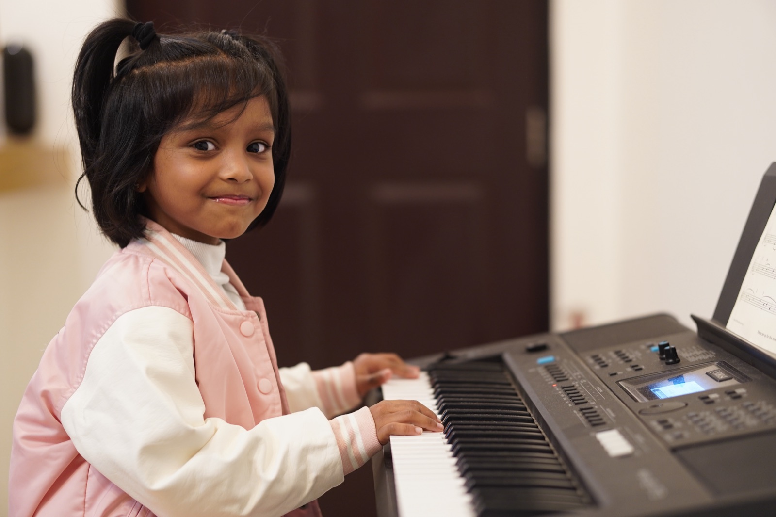 A student in a keyboard lesson with The Clavier Studio