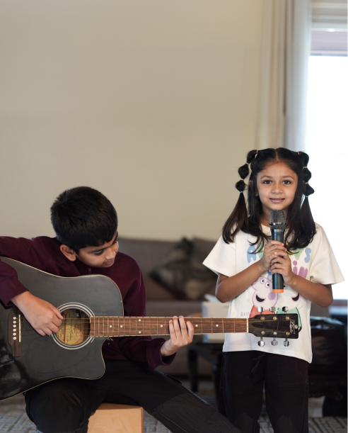 Students making music together